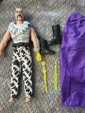 1996 Hasbro Action Man Dr. X figure, featuring his signature firing missile hand